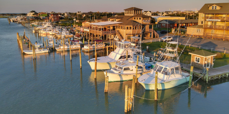 Boats sitting in a marina on Hatteras Island.